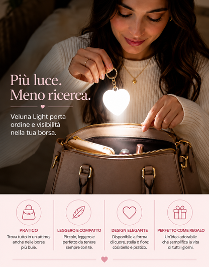 Luce da borsa a cuore che si accende da sola